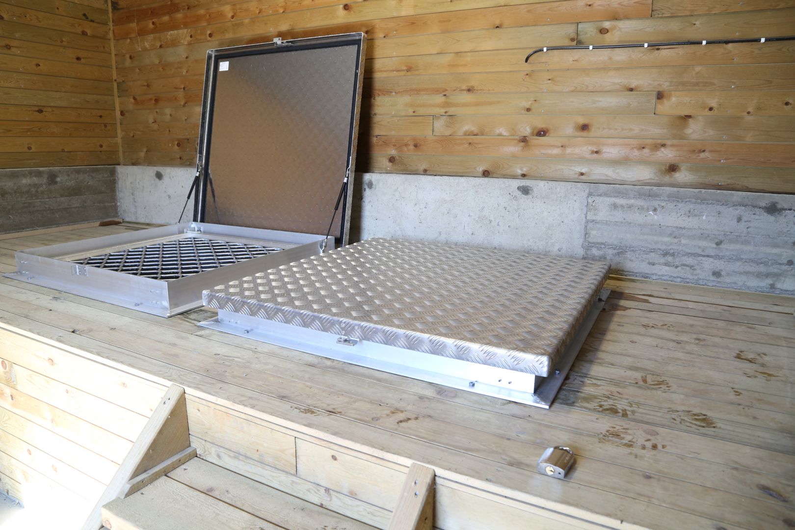 Helnor Multi-Bygg - Byflaten luker til hoydebasseng